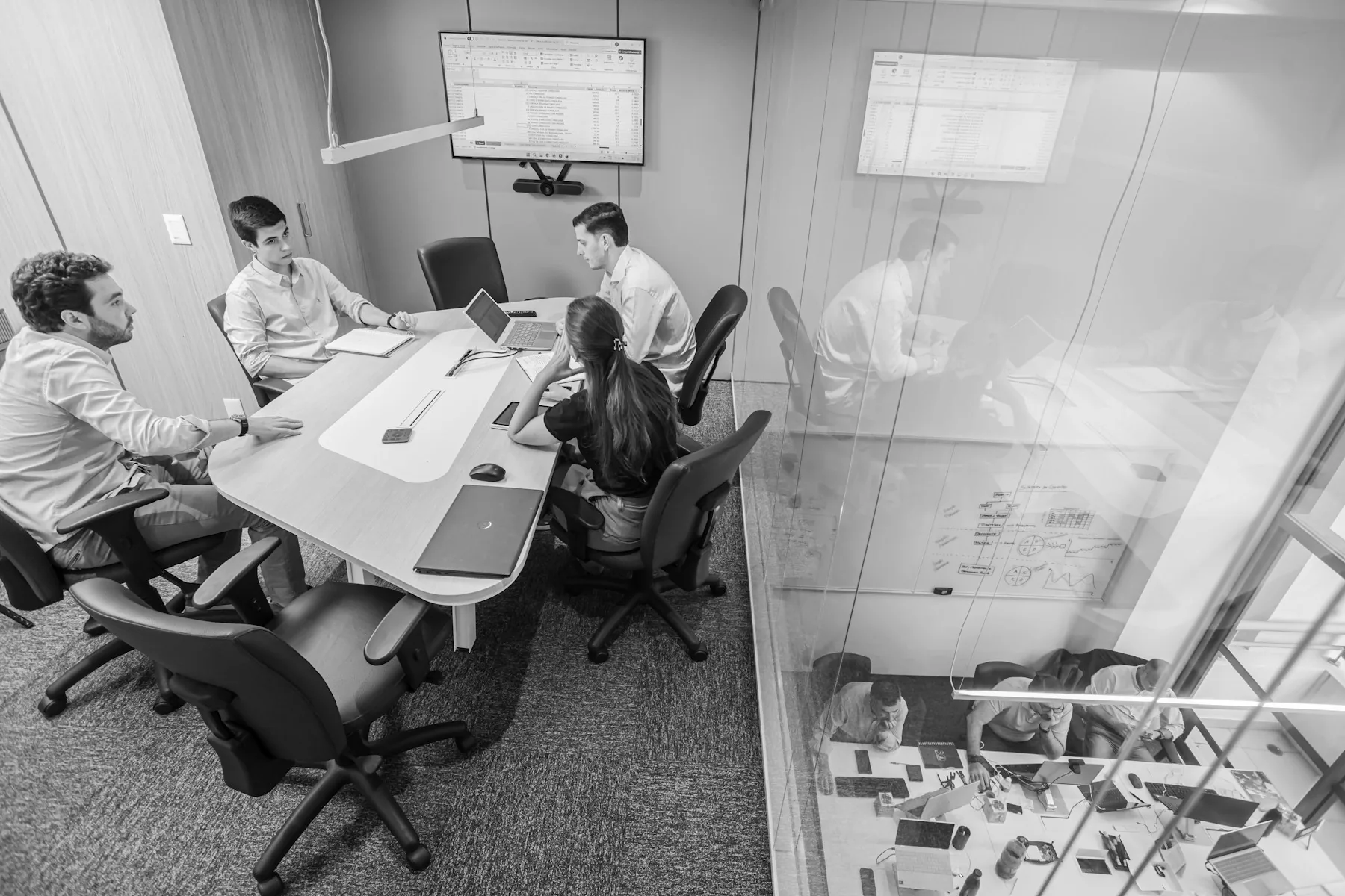 Team reviewing business performance dashboard